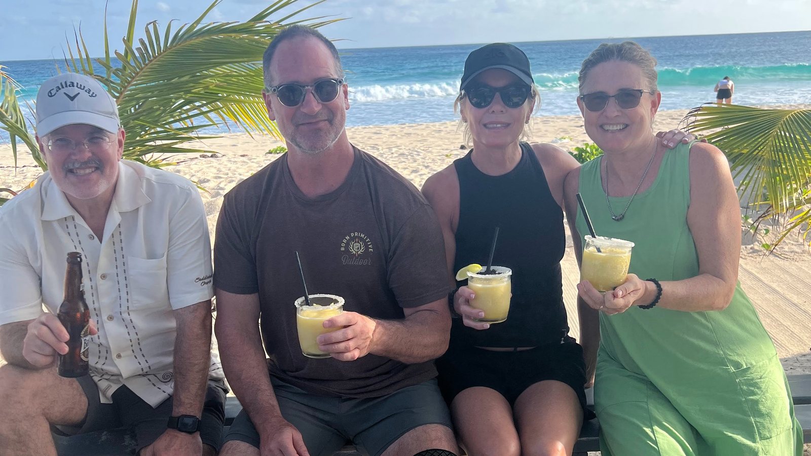 Tim McElvaine, Lorne Porayko, Jennifer Porayko and Kate Jordan together on a beach