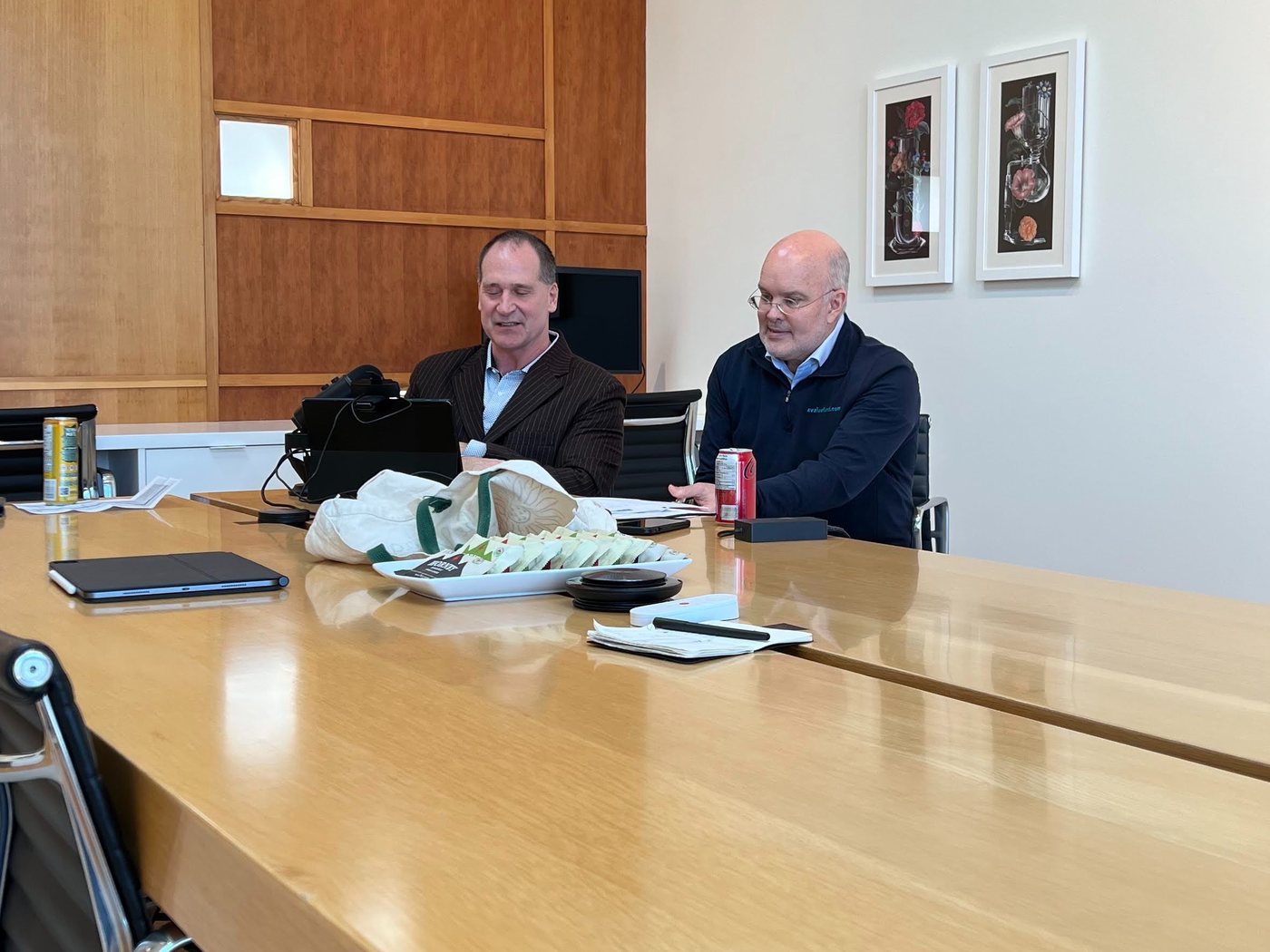 Tim McElvaine and Lorne Porayko at the boardroom table